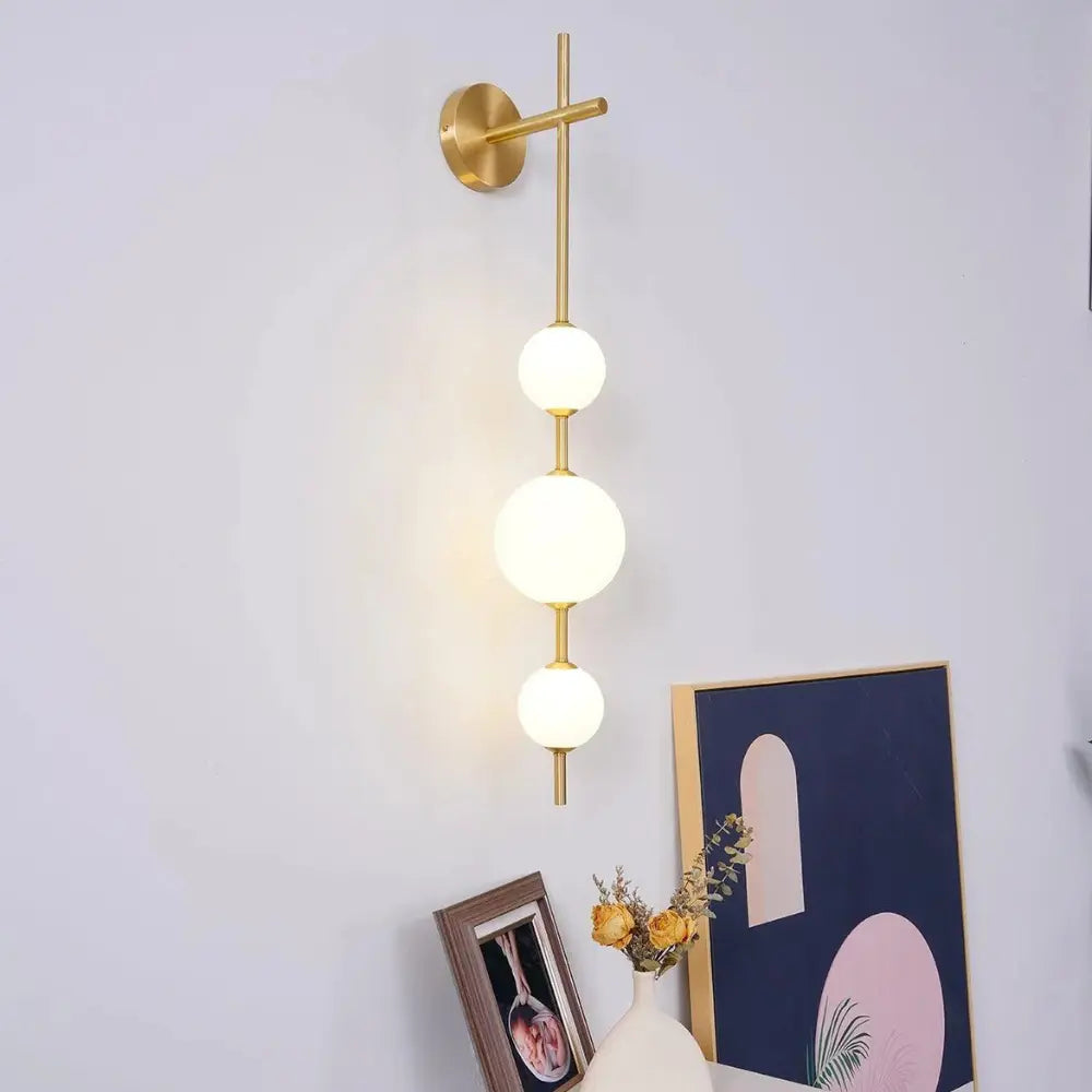 VertaGlow – Artistic Wall Light with Vertical Frame and Globe Design