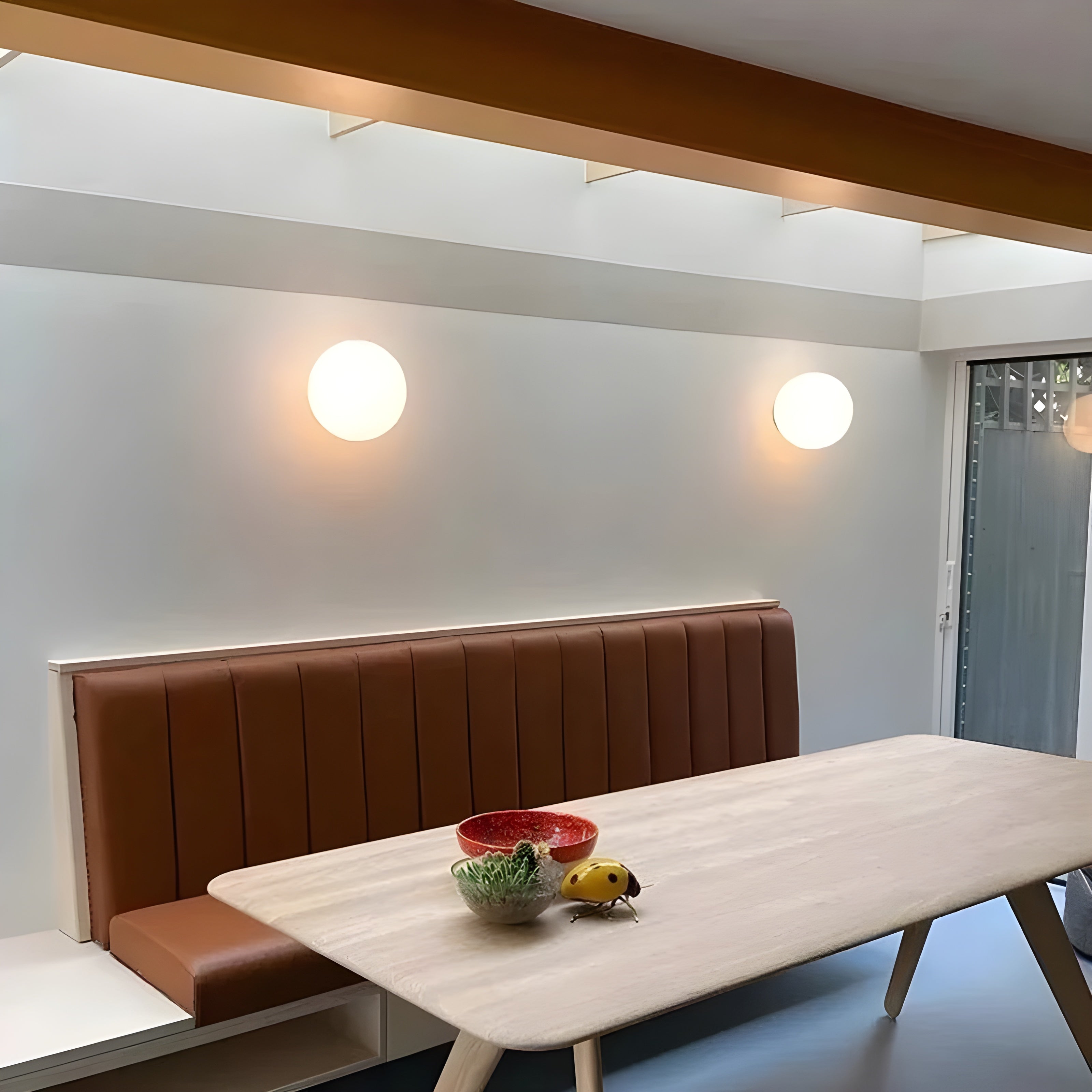 Modern Wall Lamp with Round Frosted Glass Shade and Elegant Base